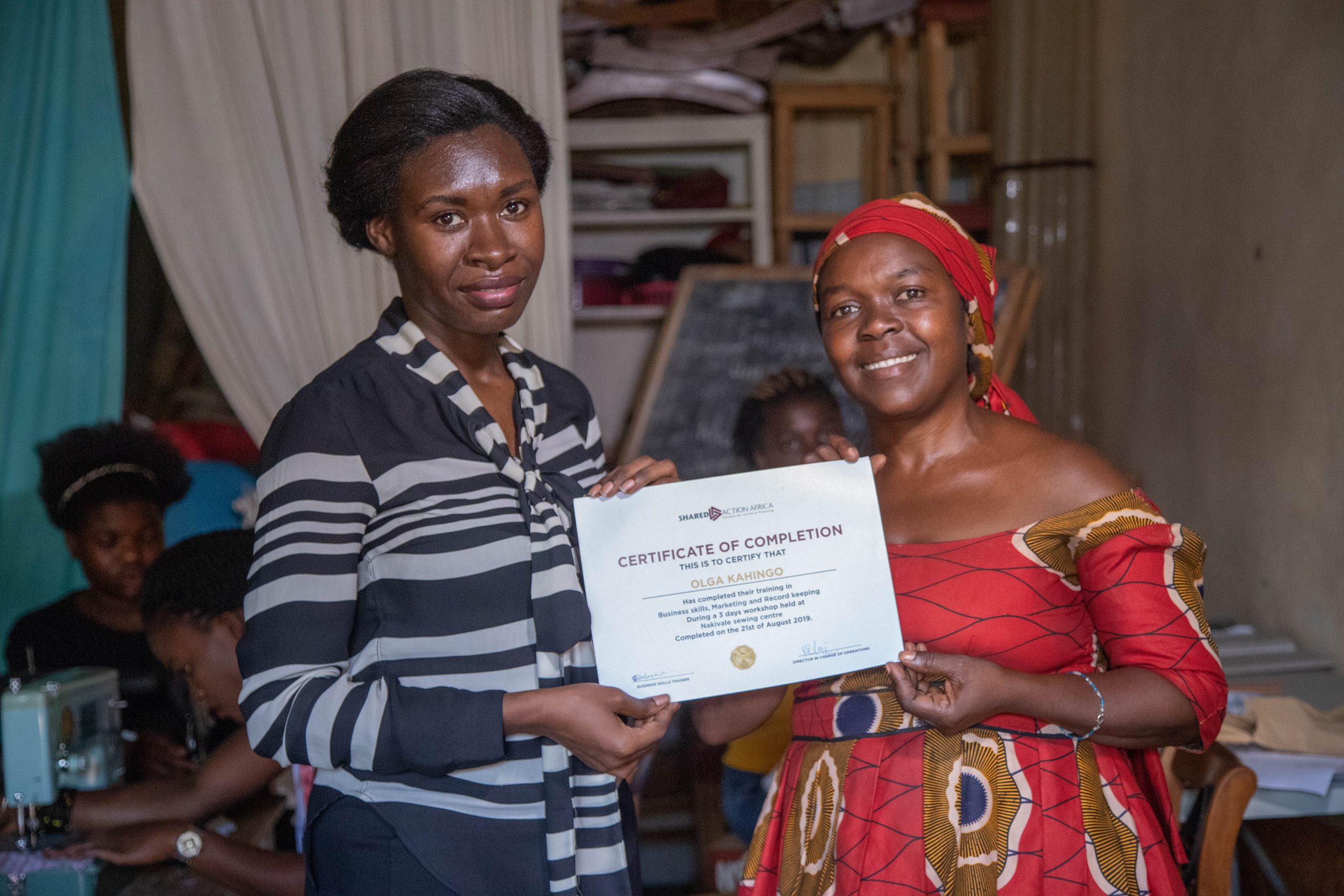 Priscilla_Givin_Out_Certificates-scaled